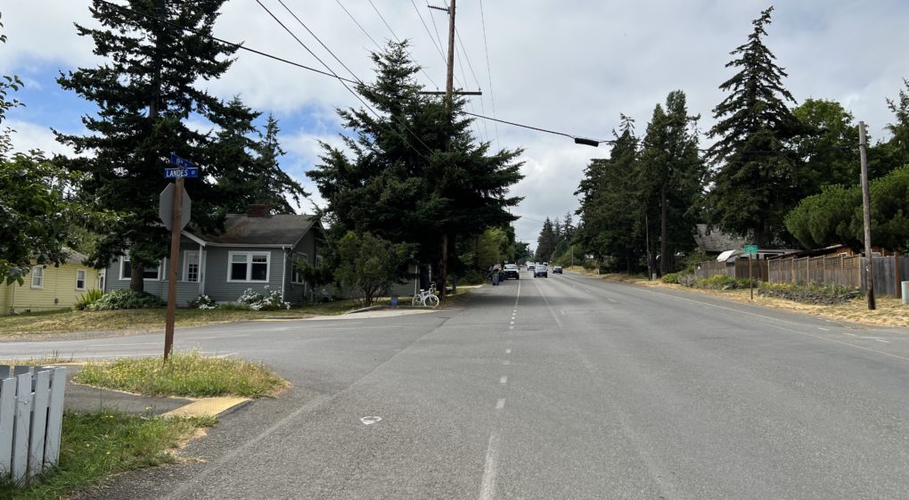 19th and Landes - wide shoulders and bike lane, "ghost bike" memorial in distance